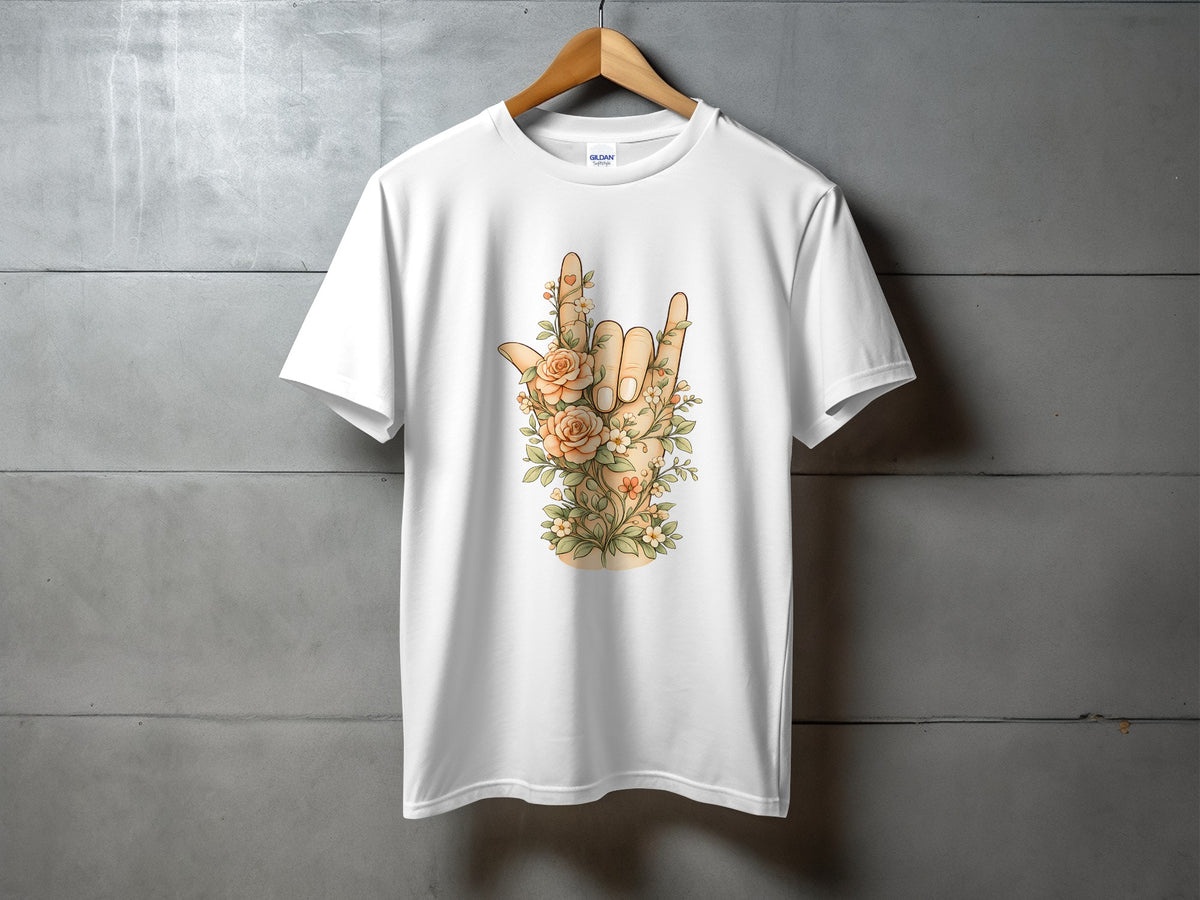 White t-shirt with a floral "rock on" hand gesture graphic.
