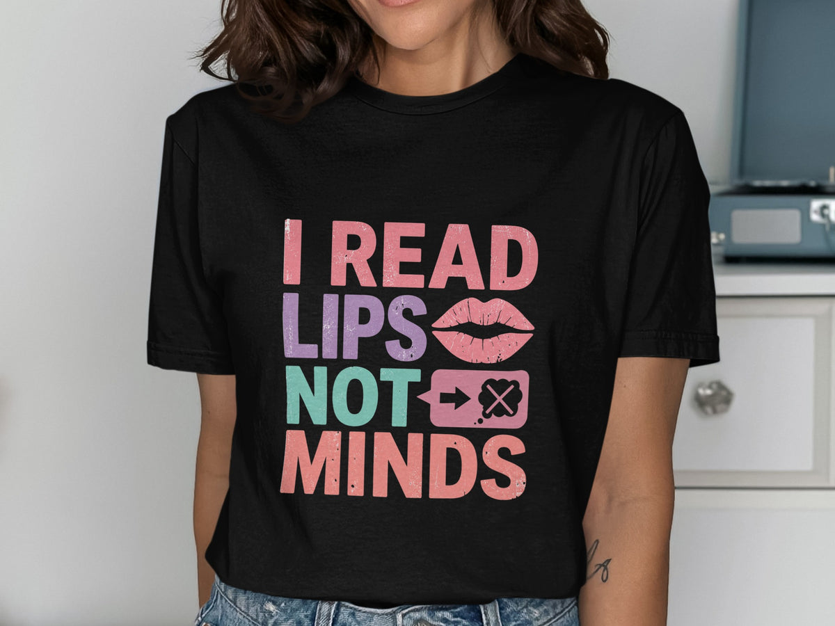Black t-shirt with text "I READ LIPS NOT MINDS" and lip graphic.