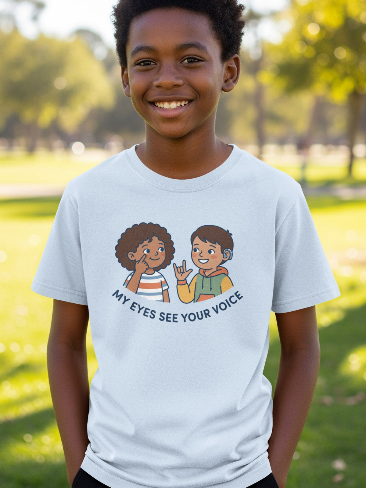 Light blue t-shirt with cartoon children signing "My eyes see your voice."