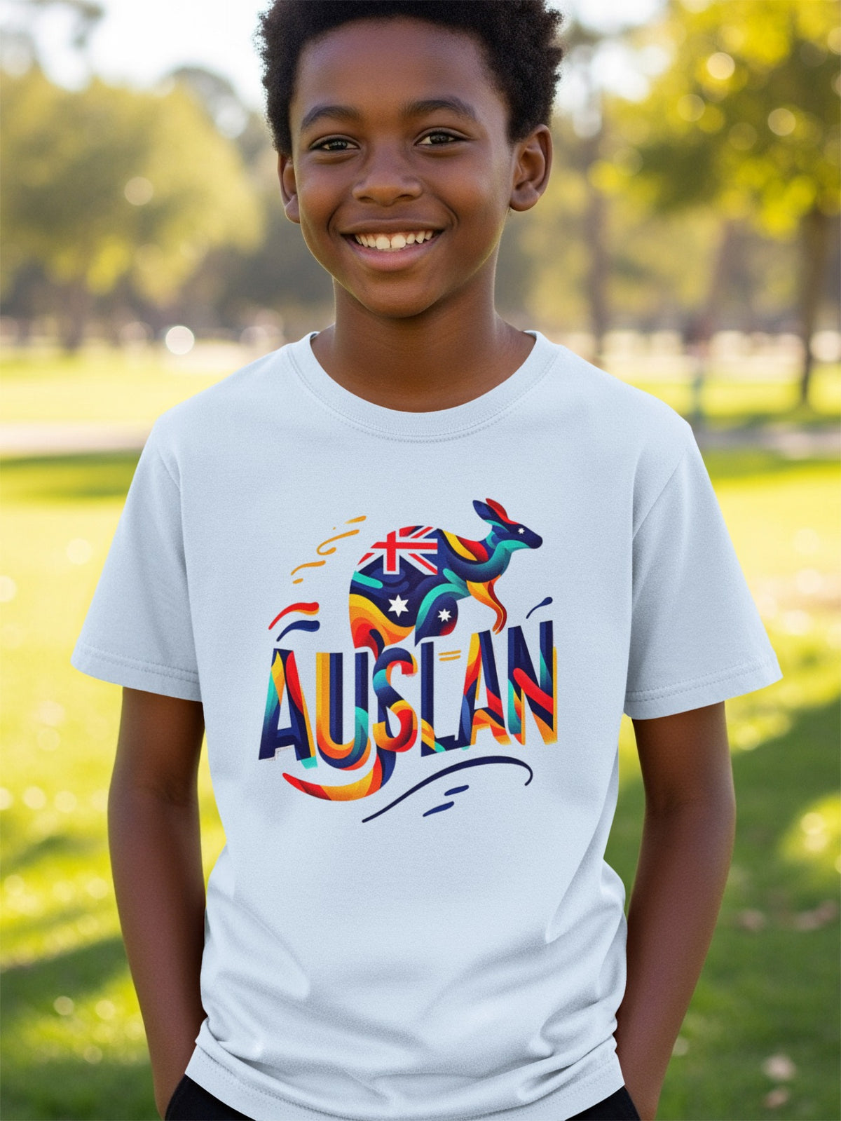 Boy wearing a t-shirt with a colorful kangaroo and "AUSLAN" text.