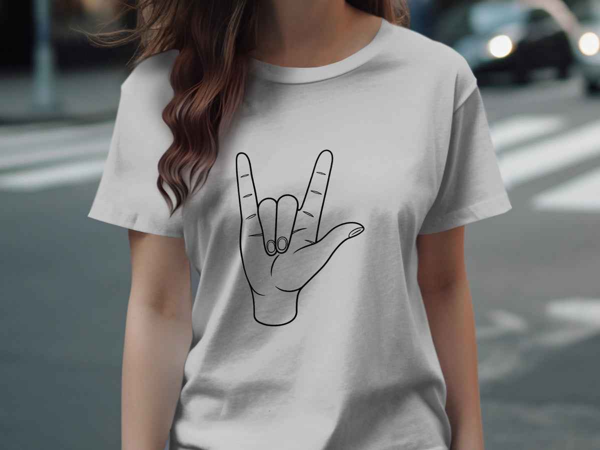 White t-shirt with a black outline drawing of a hand making the rock on sign.