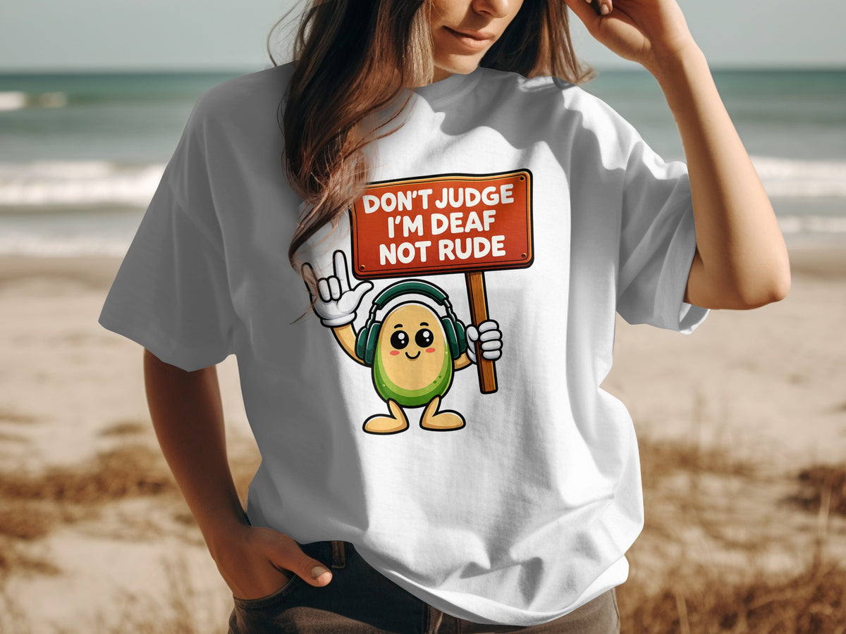 Cartoon avocado wearing headphones holds sign, "Don't judge I'm deaf not rude."