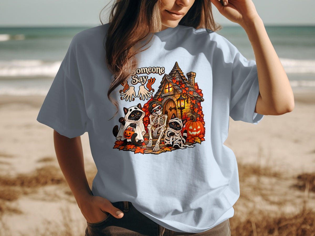 Halloween graphic with cats, skeleton, and haunted house, reads "Someone Say".