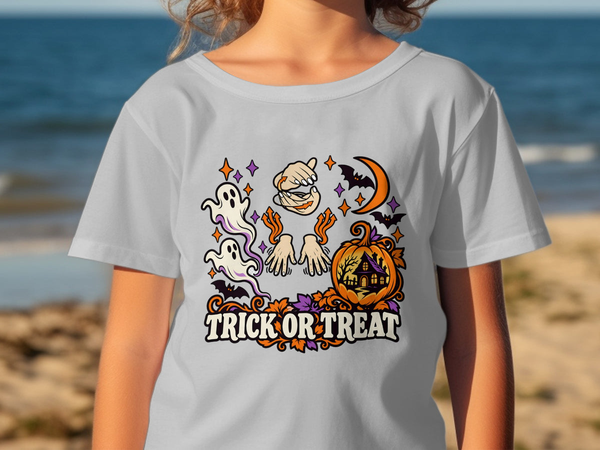 T-shirt with "Trick or Treat" text, ghosts, bats, moon, and pumpkin house graphic.