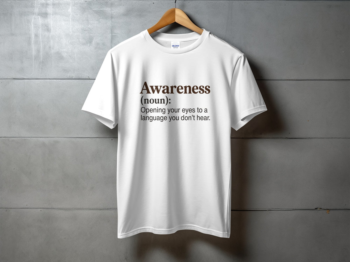 White t-shirt with "Awareness (noun): Opening your eyes to a language you don't hear."