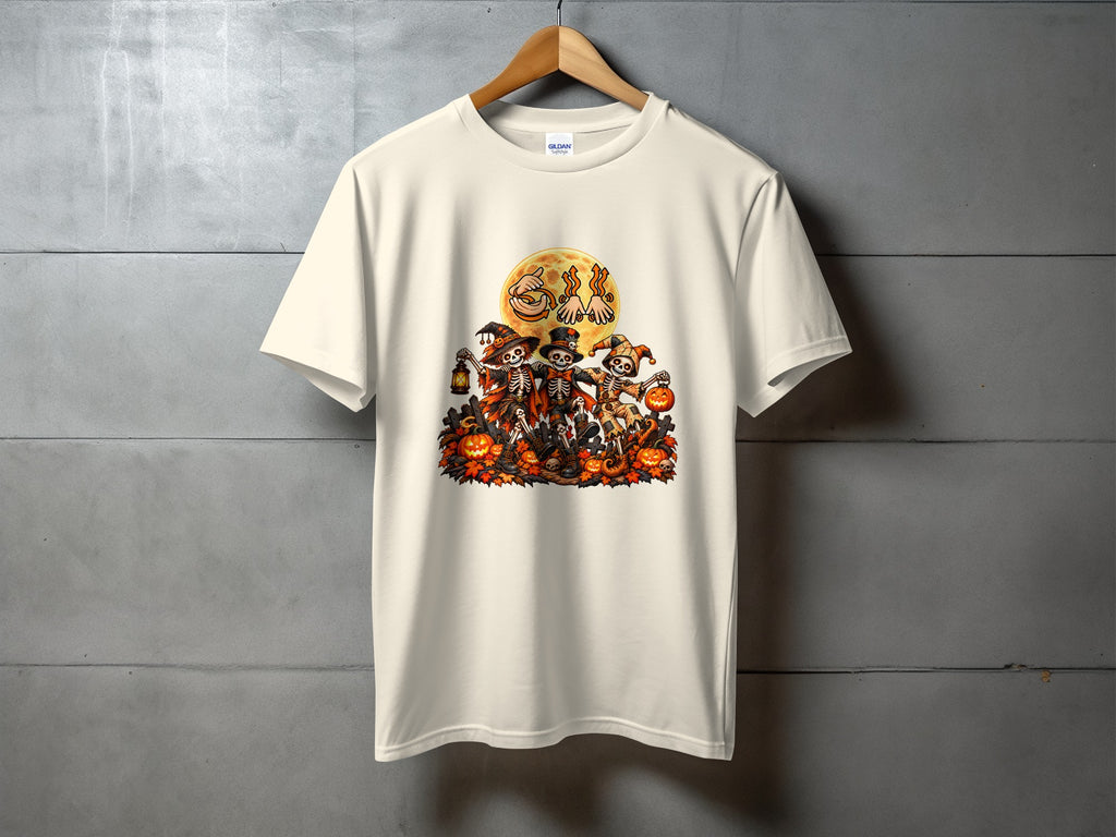 Cream t-shirt with Halloween skeletons, pumpkins, and a full moon graphic.