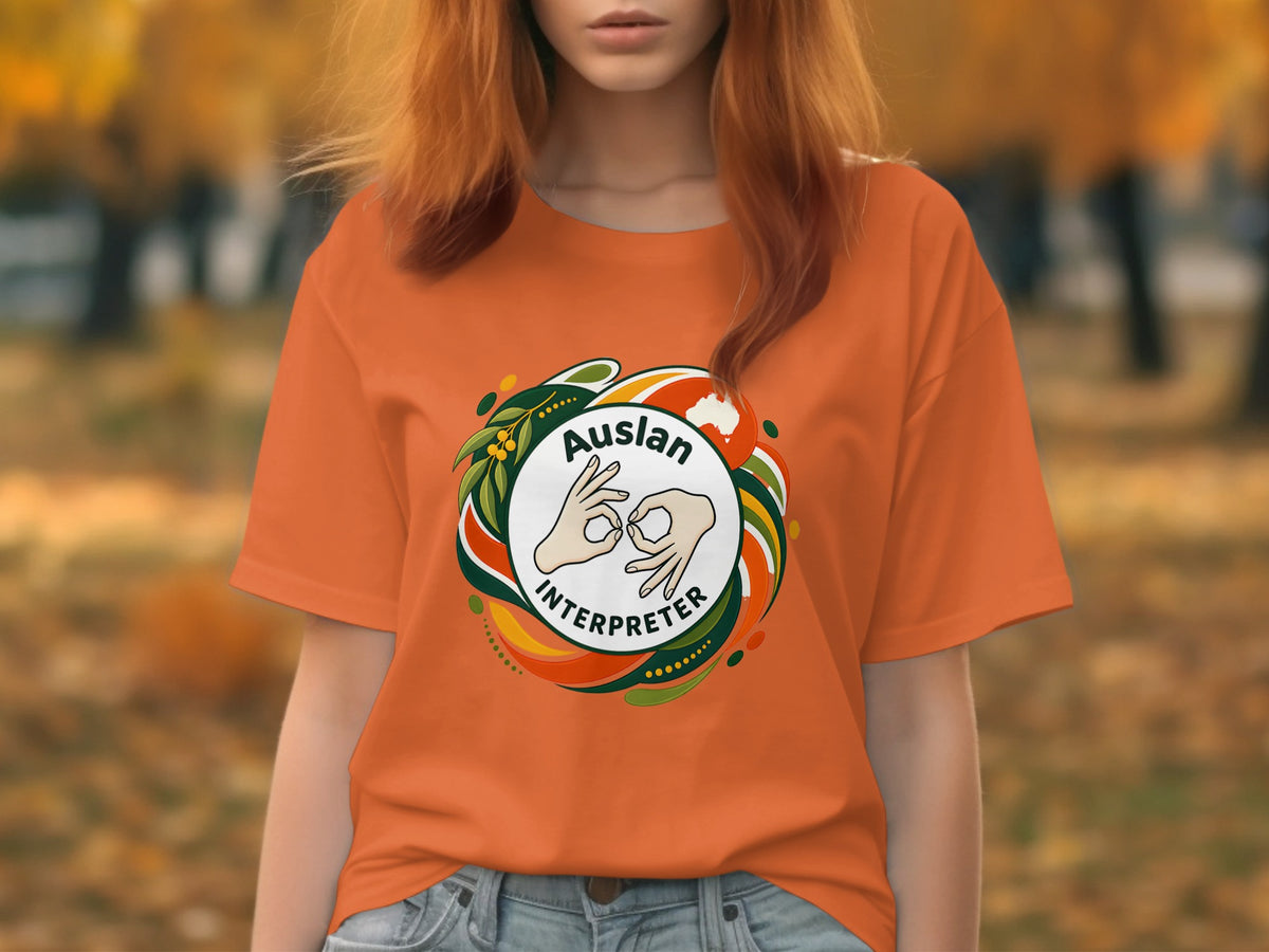 Orange t-shirt with circular Auslan Interpreter logo featuring hands and Australia map.