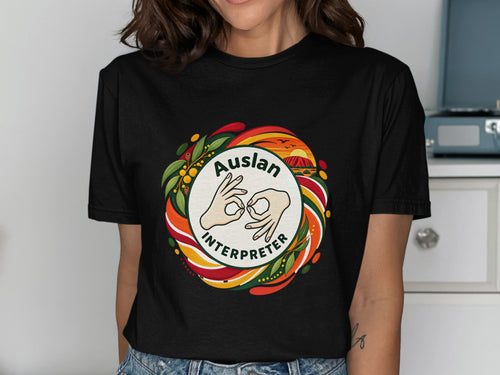 Auslan Interpreter graphic with Australian landscape and floral border on black t-shirt.