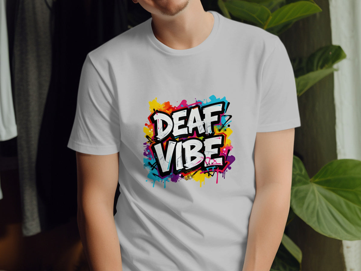 White t-shirt with "DEAF VIBE" in graffiti style with colorful paint splatters.