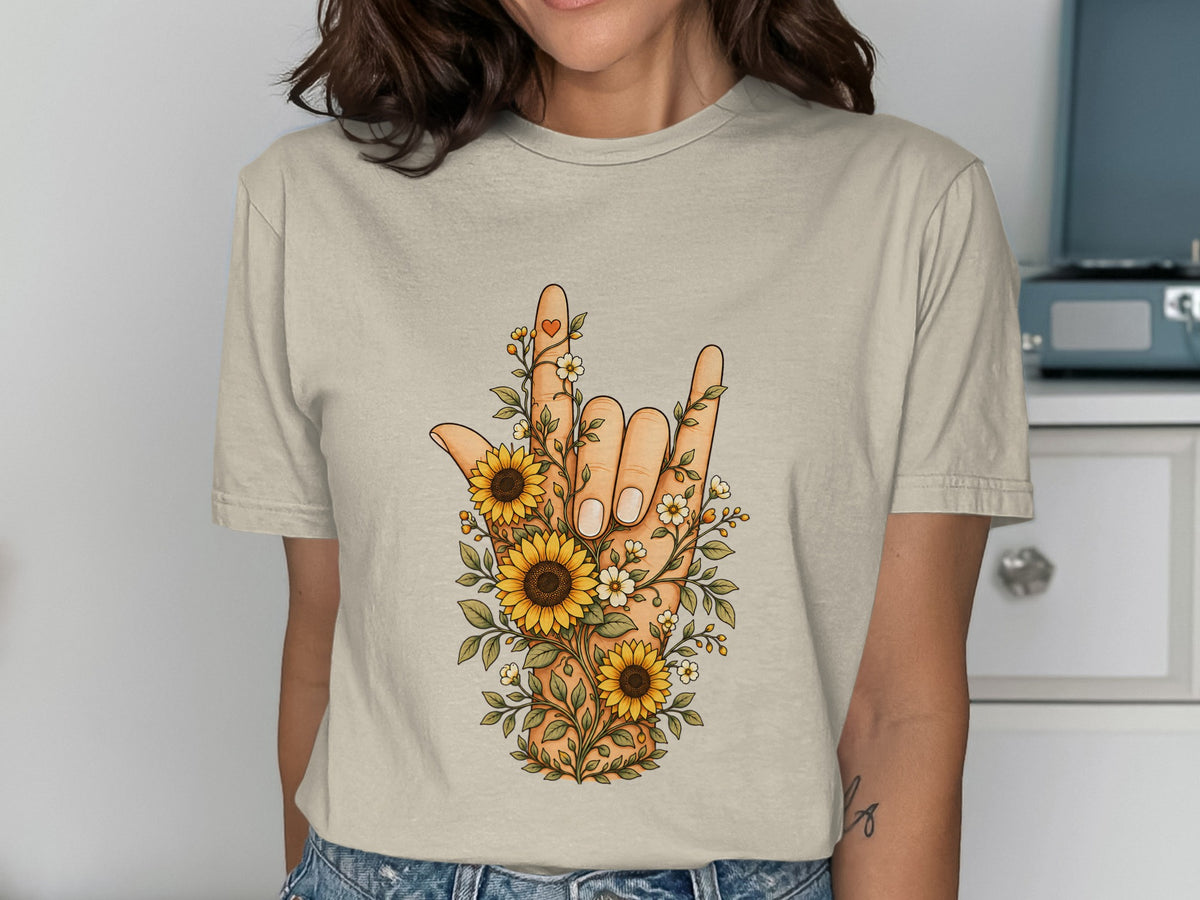 T-shirt with "I Love You" hand sign adorned with sunflowers and floral vines.