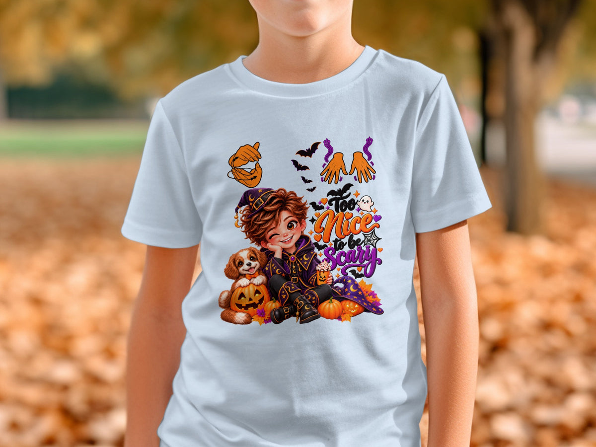 Halloween graphic on a light blue t-shirt with a witch, dog, pumpkin, and bats.