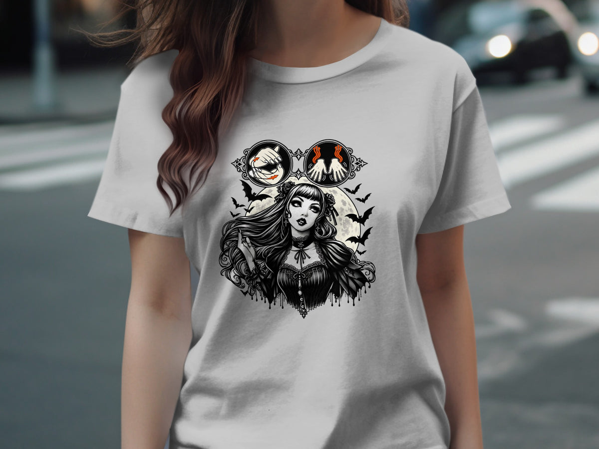 Gothic woman with bats and moon graphic on a t-shirt.