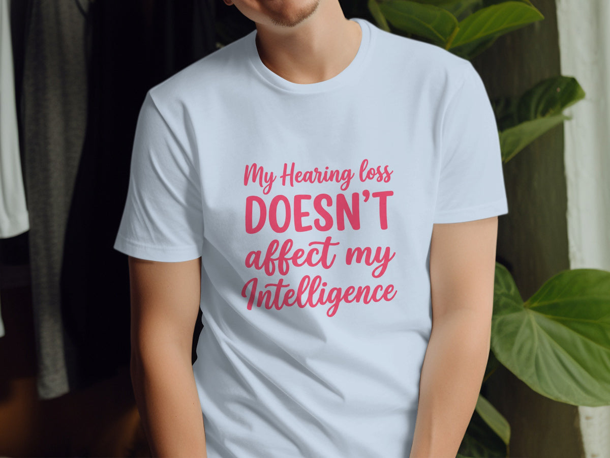 White t-shirt with pink text: "My Hearing loss DOESN'T affect my Intelligence".