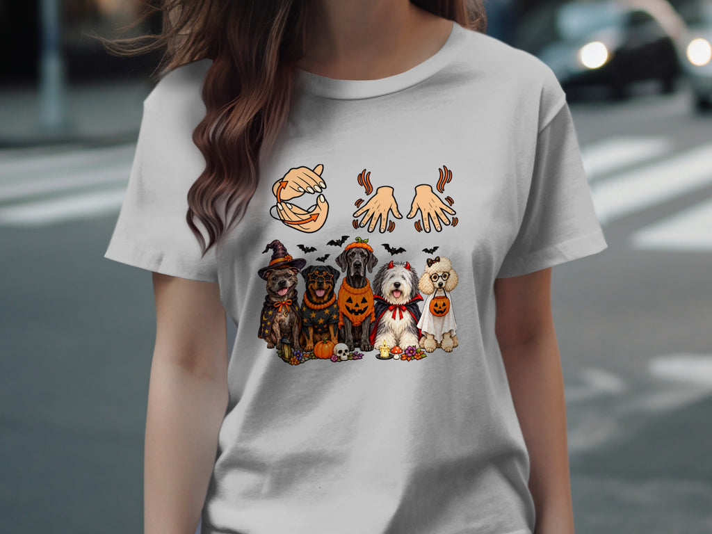 T-shirt with dogs in Halloween costumes and hand gesture graphics.