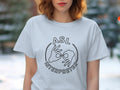 White t-shirt with ASL Interpreter graphic featuring two hands making sign language symbols.