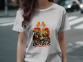 White t-shirt with "31 October" graphic featuring a wolf and autumn forest scene.
