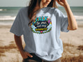 Light blue t-shirt with "TALK to me, not my INTERPRETER" graphic.