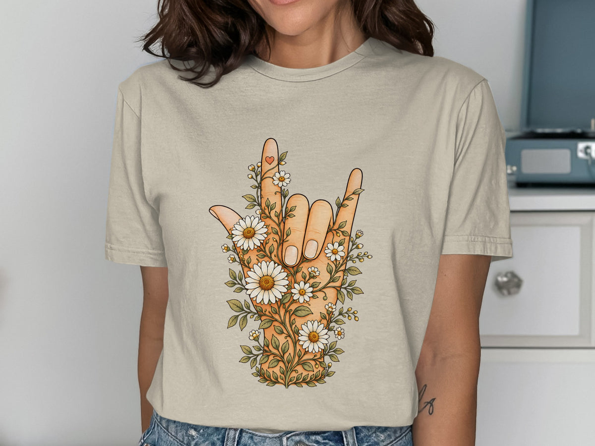 Hand with flowers and heart symbol, made in sign language.