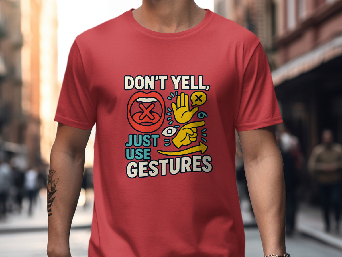 Red t-shirt with "Don't yell, just use gestures" text and graphic icons.