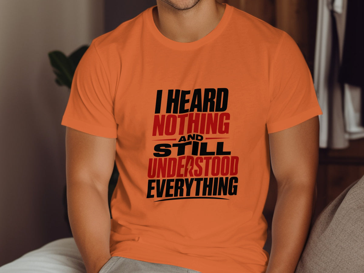 Orange t-shirt with "I heard nothing and still understood everything" text.