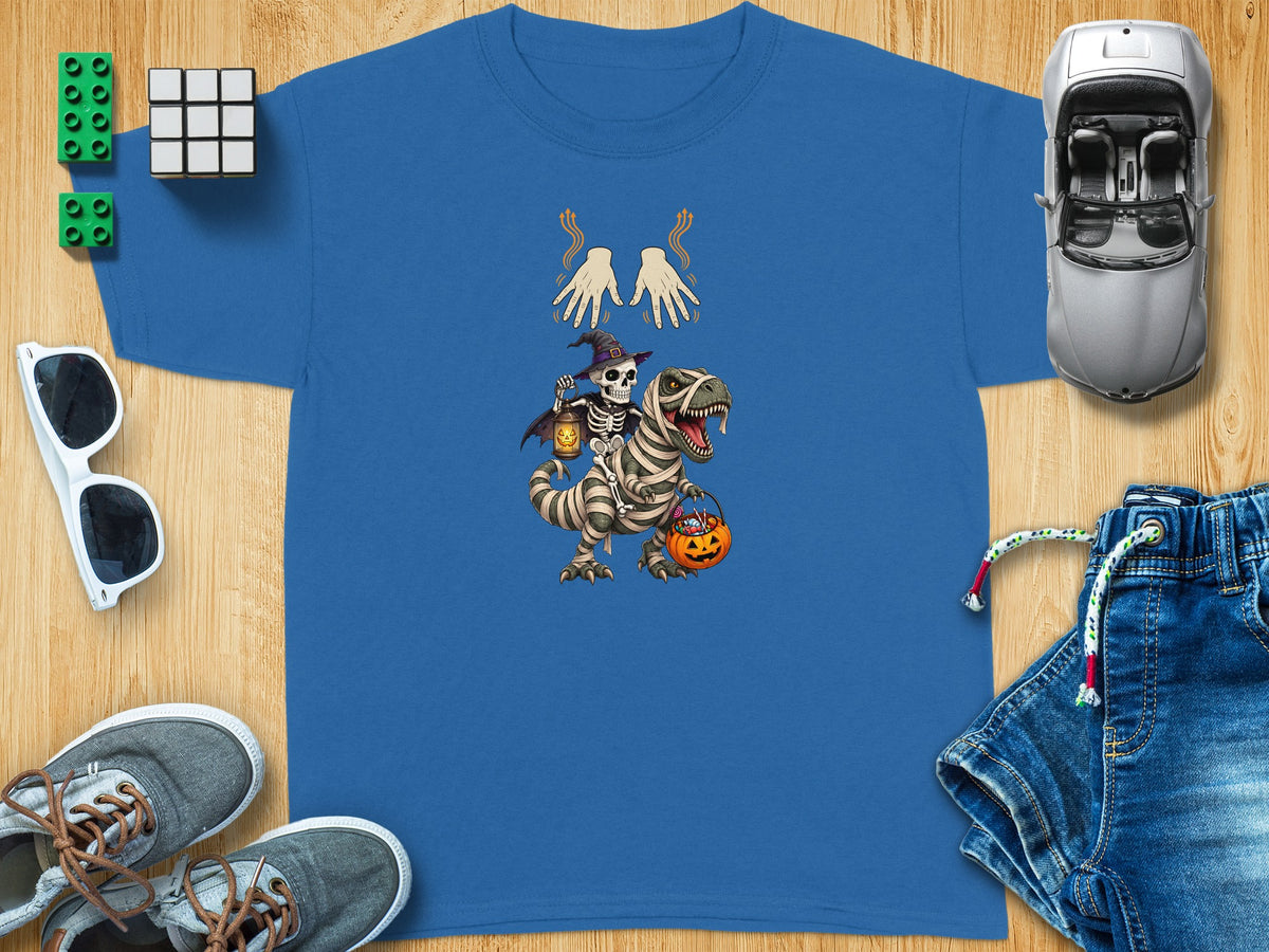 Skeleton riding a mummy dinosaur wearing a witch hat, carrying a pumpkin candy bucket.
