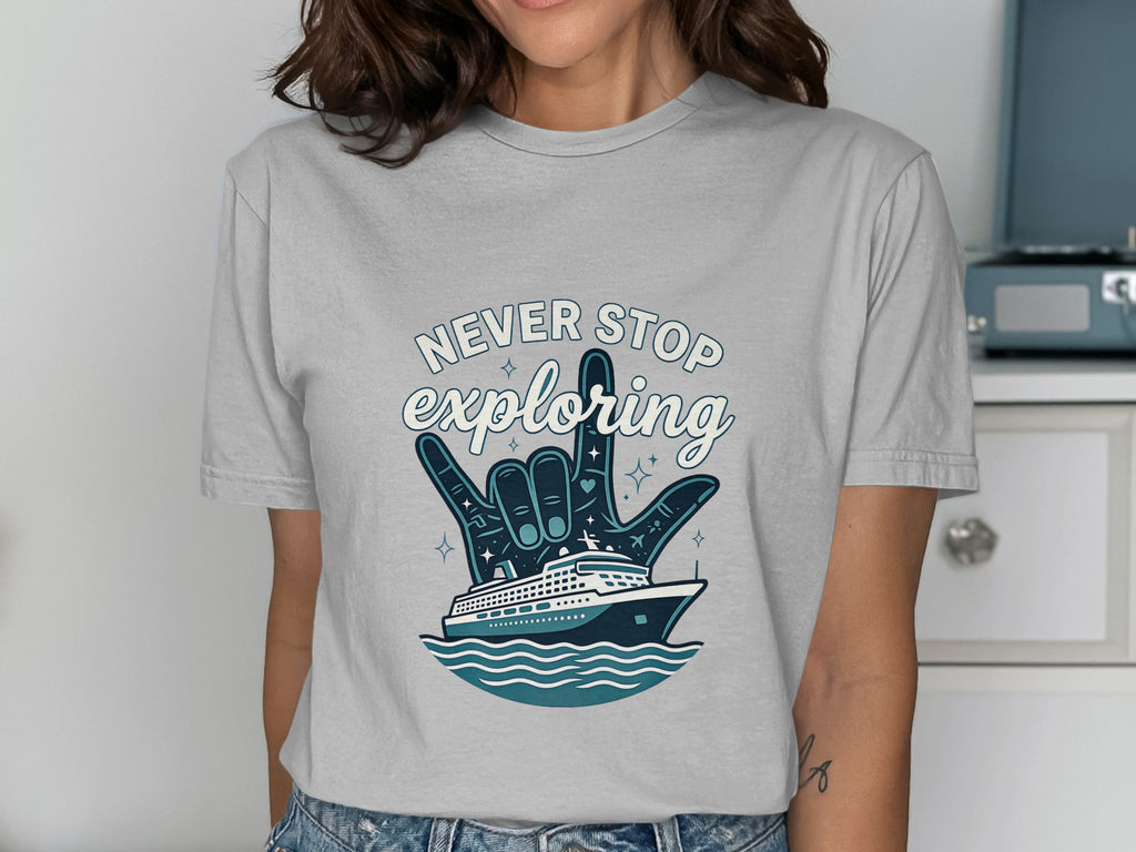 Grey t-shirt with "Never Stop Exploring" text and a cruise ship design.