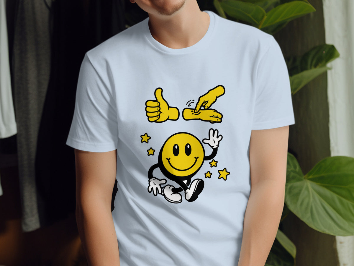 Light blue t-shirt with a cartoon smiley face and two yellow hands.