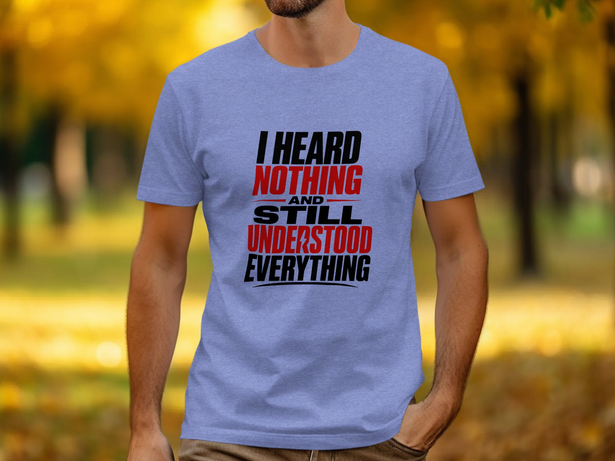 Light blue t-shirt with text "I HEARD NOTHING AND STILL UNDERSTOOD EVERYTHING".