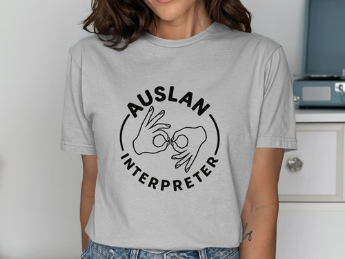 AUSLAN interpreter text with a circular logo of two hands signing.