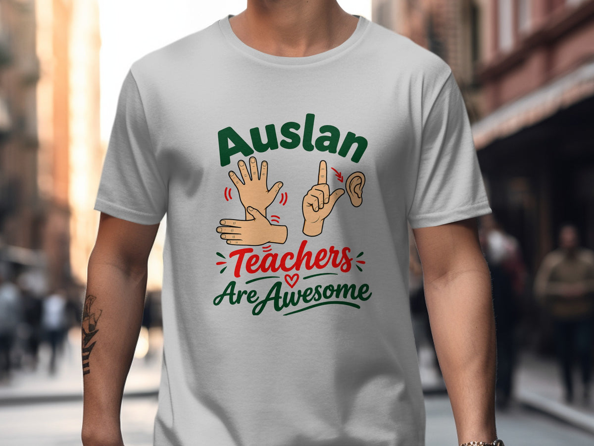 White t-shirt with green text "Auslan Teachers Are Awesome" and sign language graphics.
