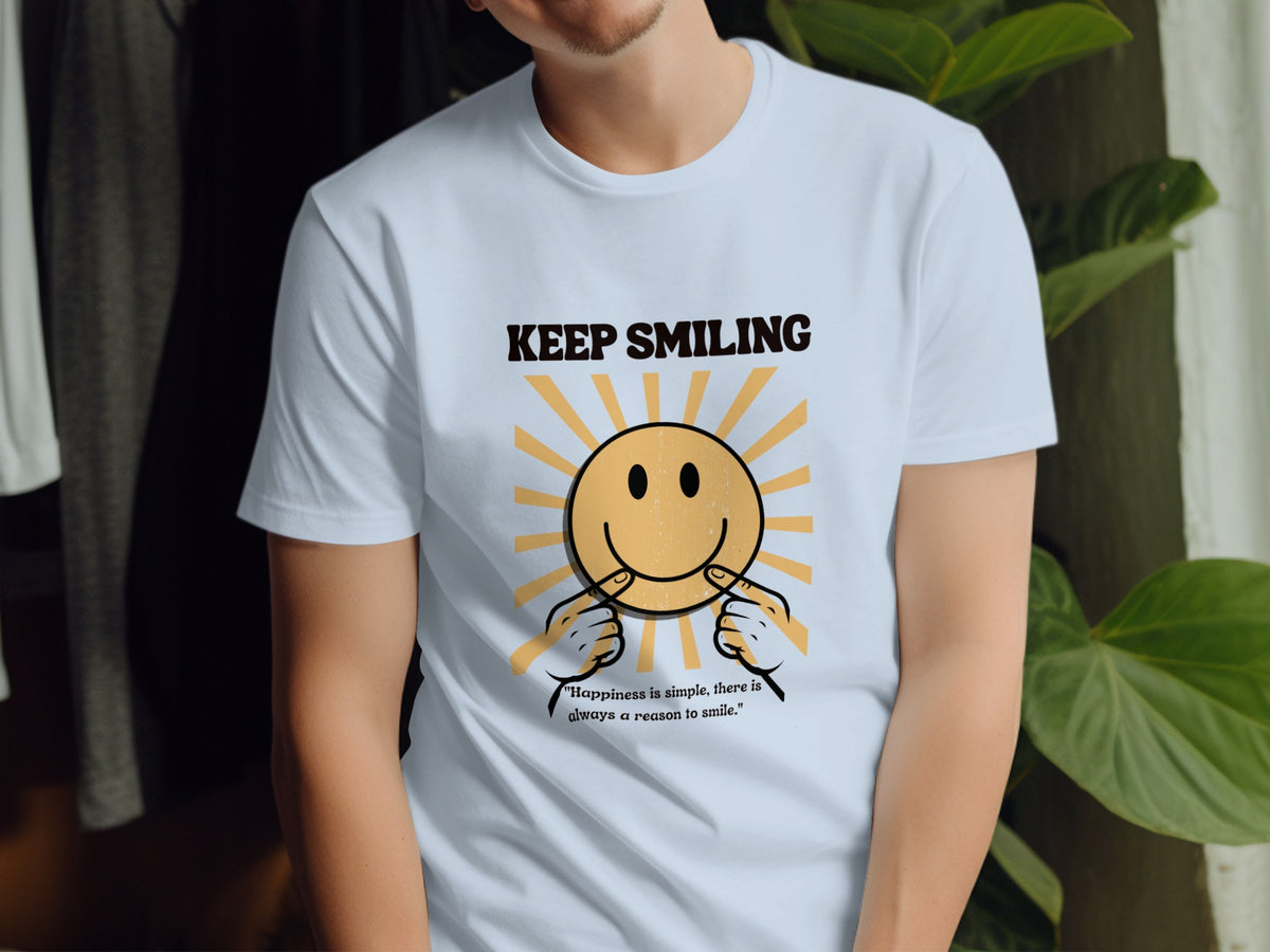 Light blue t-shirt with "KEEP SMILING" text and smiley face graphic.