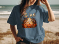 T-shirt with a Halloween graphic of a ghost, pumpkin, and fall leaves.