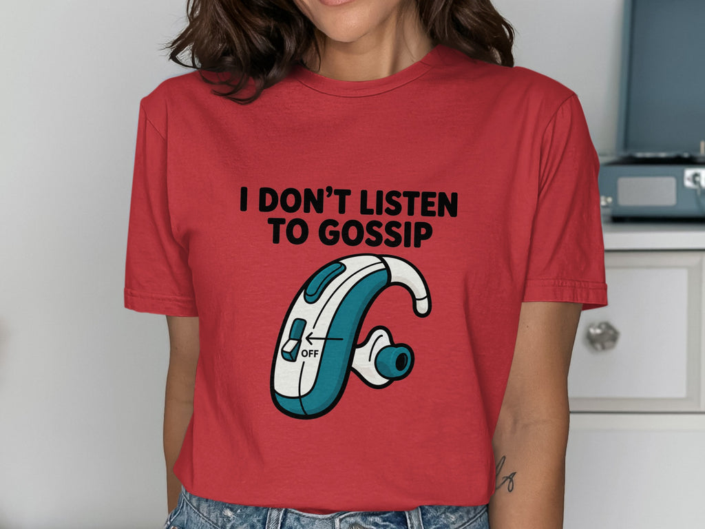 Red t-shirt with text "I DON'T LISTEN TO GOSSIP" and a hearing aid graphic.