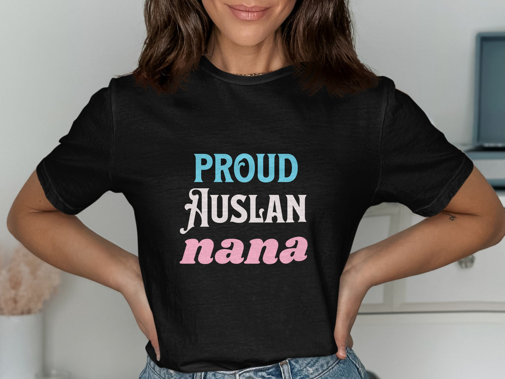 Black t-shirt with "Proud Auslan Nana" text in blue, white, and pink lettering.