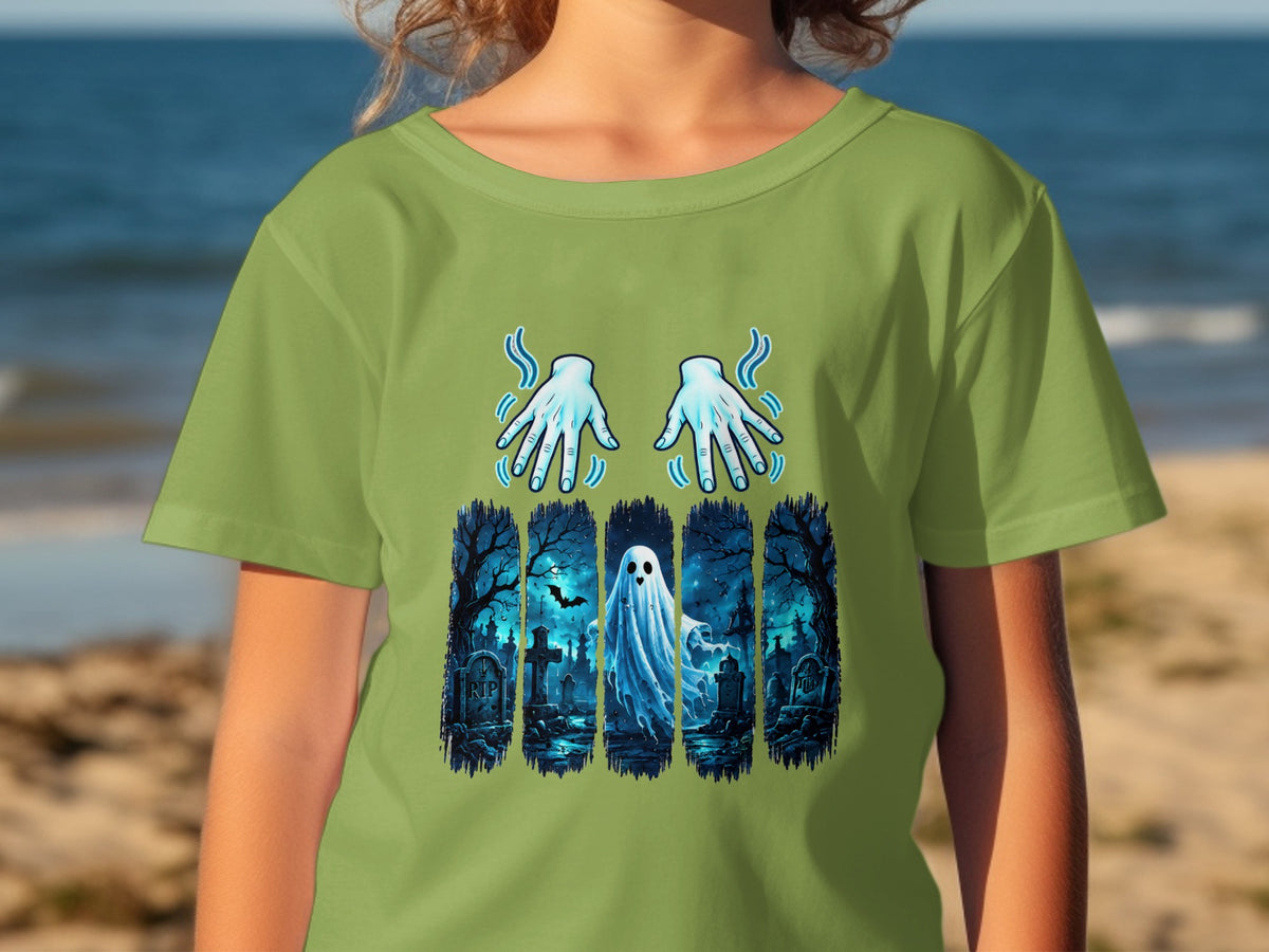 Green t-shirt with ghostly hands and a haunted graveyard scene.