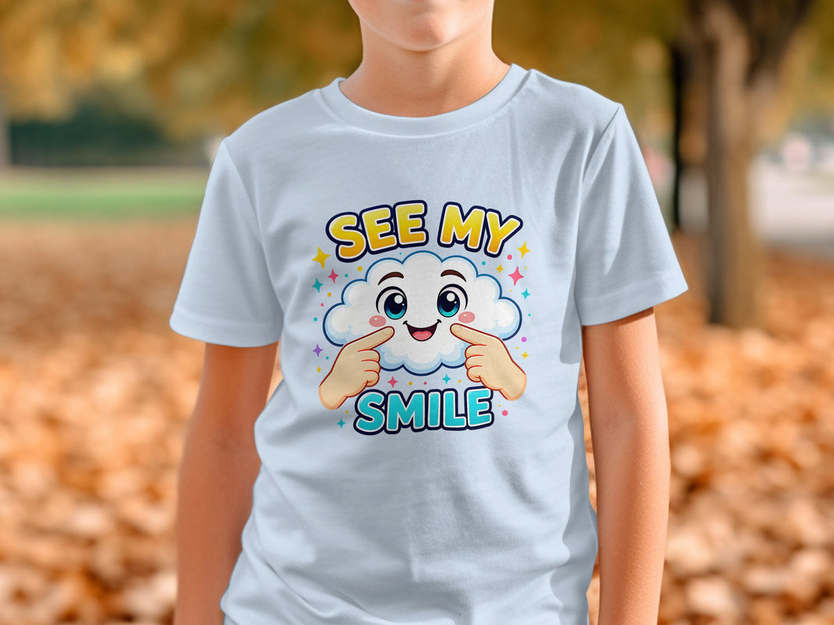 Light blue t-shirt with cartoon cloud, stars, and text "SEE MY SMILE".