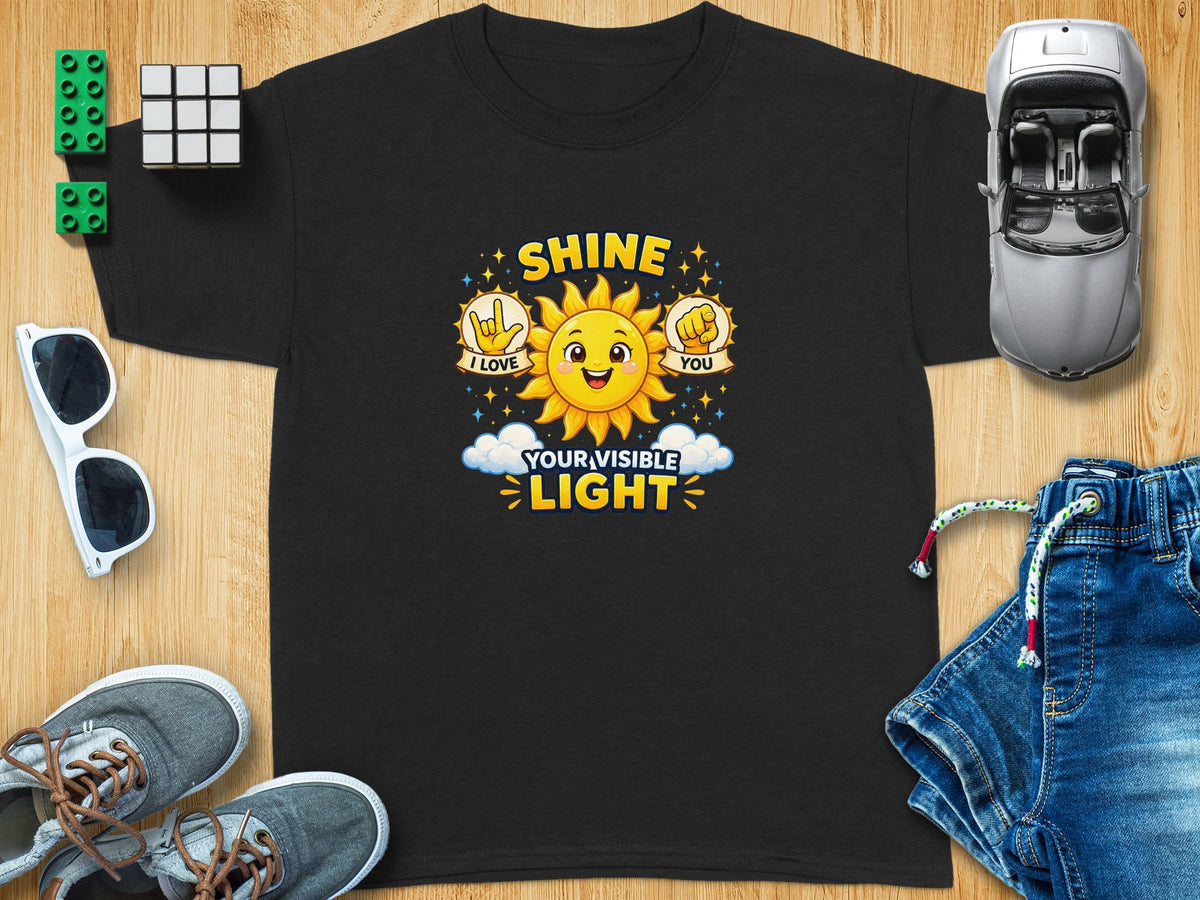 Black t-shirt with a smiling sun graphic saying "Shine I Love You Your Visible Light."