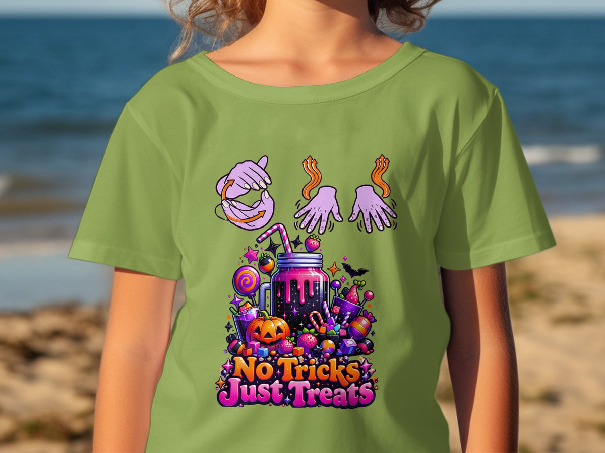 Green t-shirt with "No Tricks Just Treats" text and Halloween candy graphic.