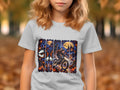 Halloween graphic with witch on bike in graveyard and haunted castle.