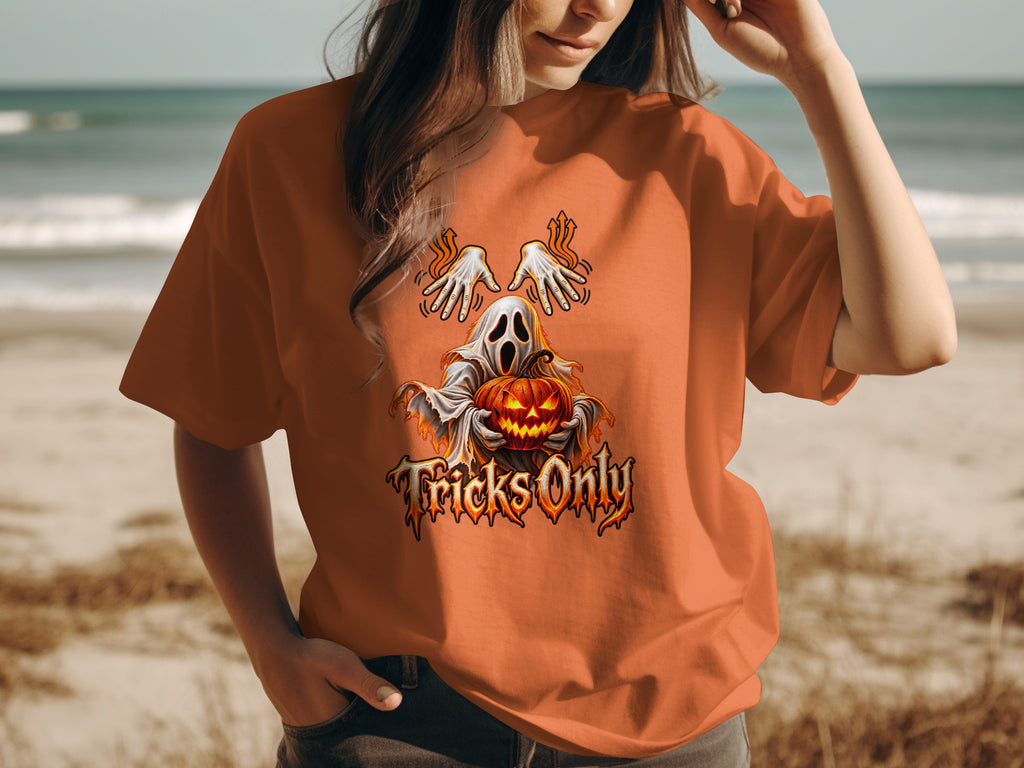 Orange t-shirt with ghost, pumpkin, and "Tricks Only" text.