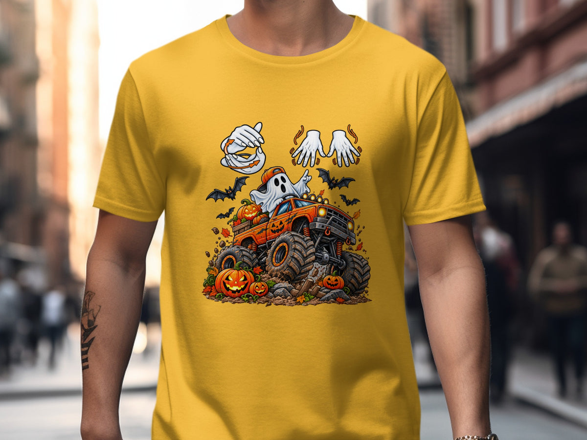 Halloween monster truck with ghost, pumpkins, and bats graphic on yellow shirt.