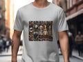 White t-shirt with gothic doll graphic featuring a pumpkin, a doll with a toy, and spooky background elements.