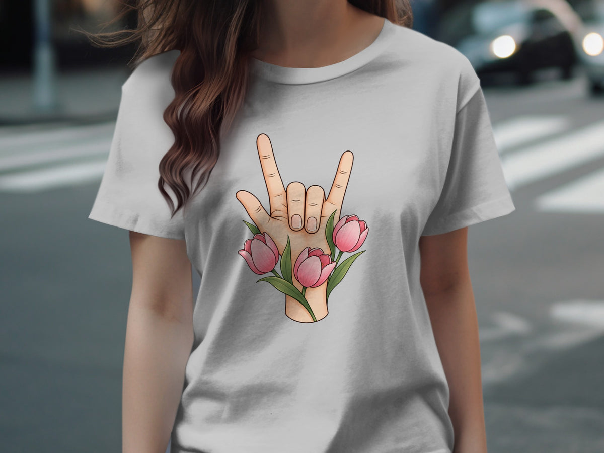T-shirt with a hand making the rock on symbol surrounded by pink tulips.