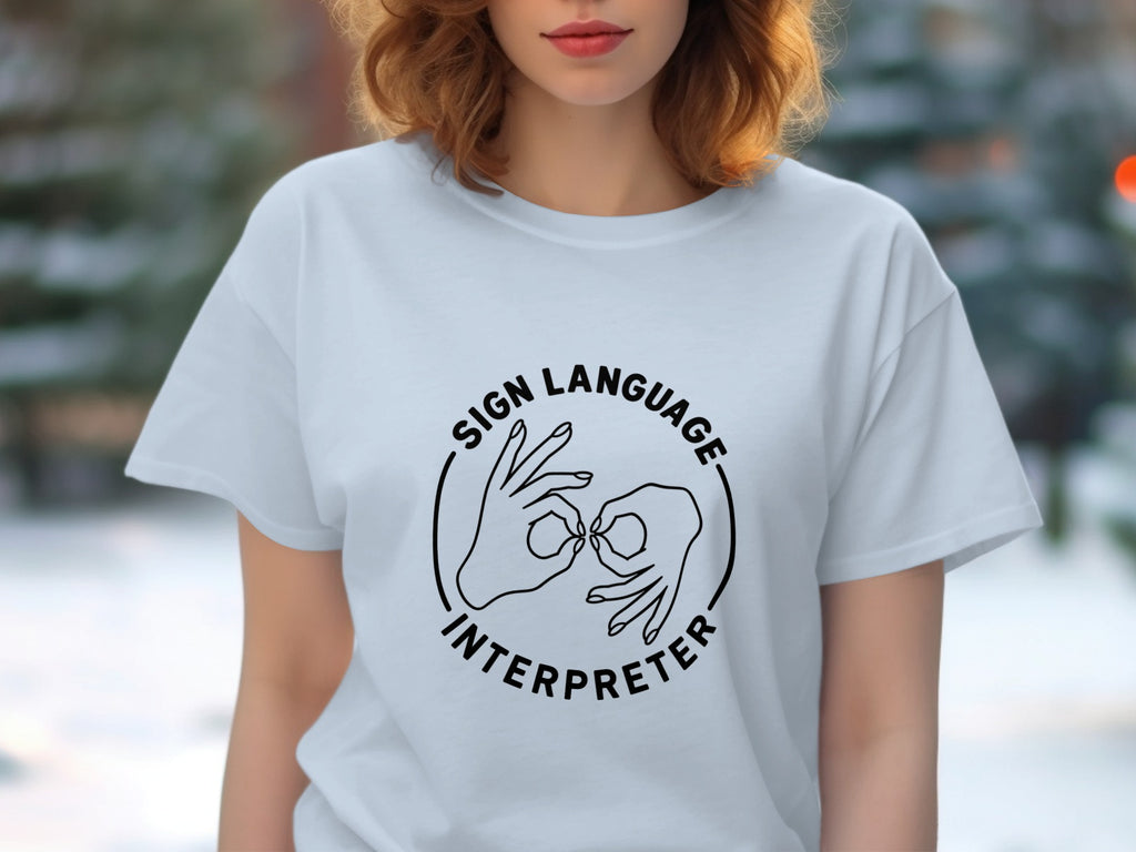 White t-shirt with black circular graphic of hands signing, "Sign Language Interpreter."