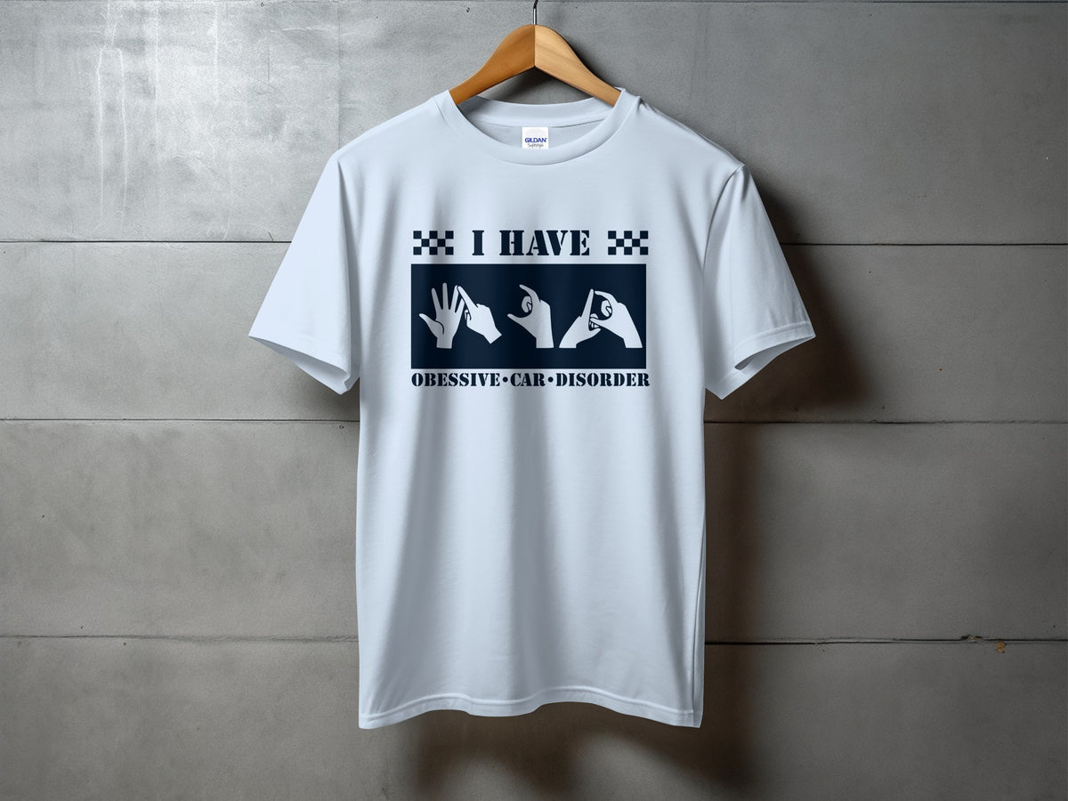 Light blue t-shirt with "I HAVE" and car-themed hand gestures.