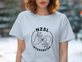 White t-shirt with black NZSL Interpreter text and hand sign graphic.