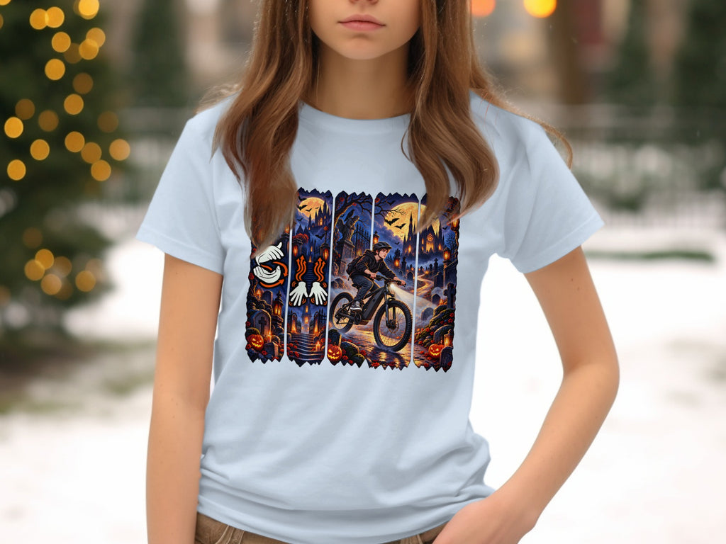 Light blue t-shirt with a Halloween graphic featuring a cyclist in a cemetery.