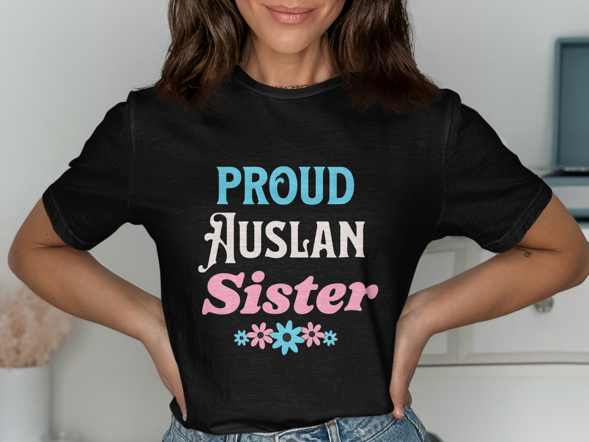 Black t-shirt with "Proud Auslan Sister" text and floral accents.