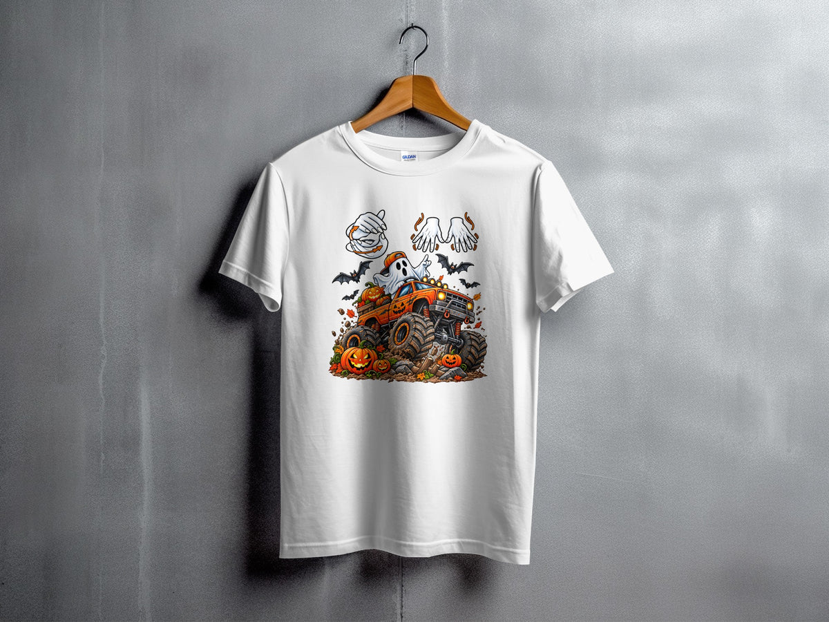 White t-shirt with Halloween graphic featuring a monster truck, ghost, and pumpkins.