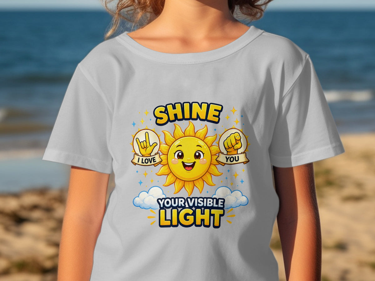 T-shirt with sun graphic and text "SHINE I LOVE YOU YOUR VISIBLE LIGHT".